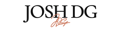 The text 'JOSH DG' appears in large black serif letters on a white background, with a small cursive orange-red signature mark below the 'S'.